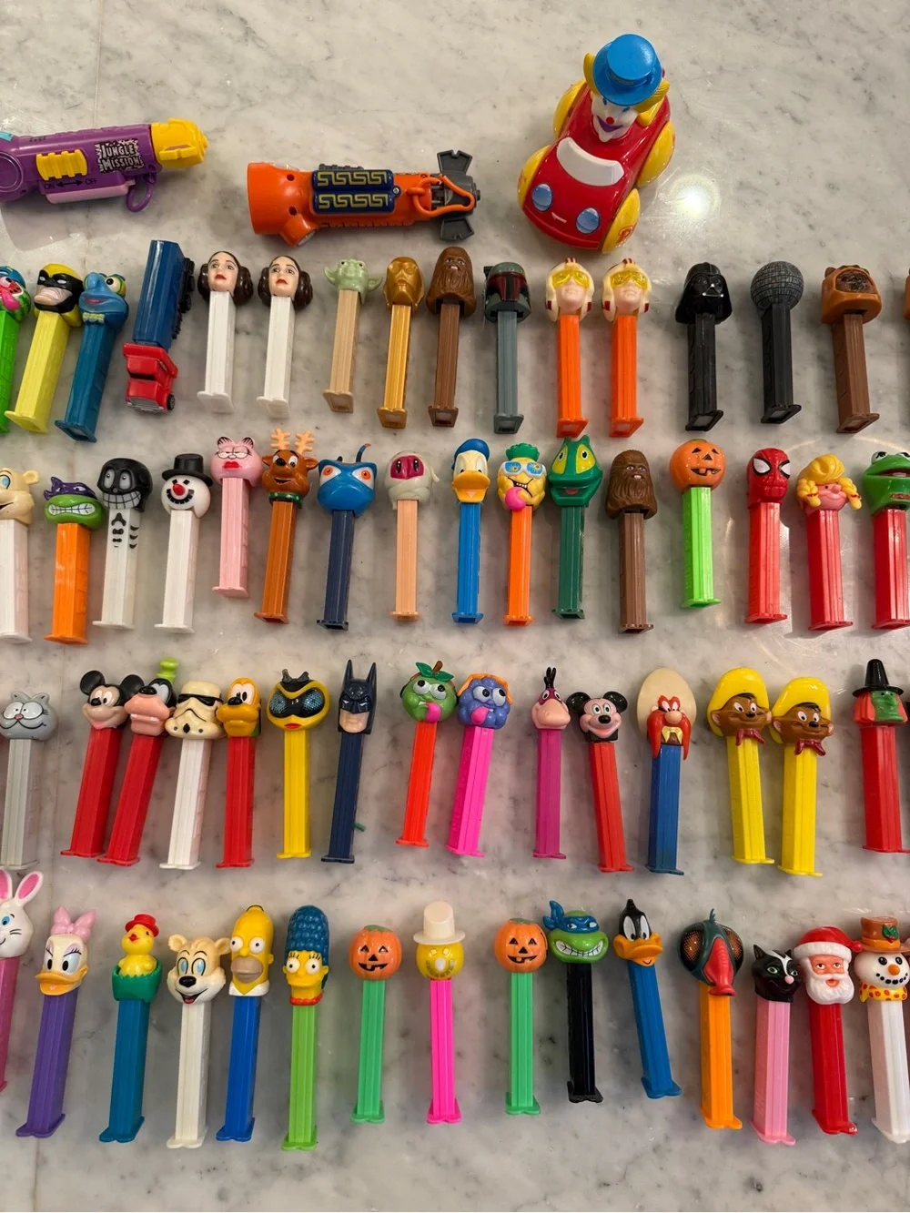 Huge Lot of 126 PEZ Dispensers 1990s-2010s Disney Star Wars Garfield Holiday